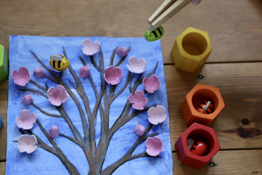 Cherry Blossom Tree and Plan Toys Bee Hives, made from Tony's egg box!